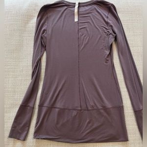Light Purple Lululemon long sleeve shirt with thumb holes.